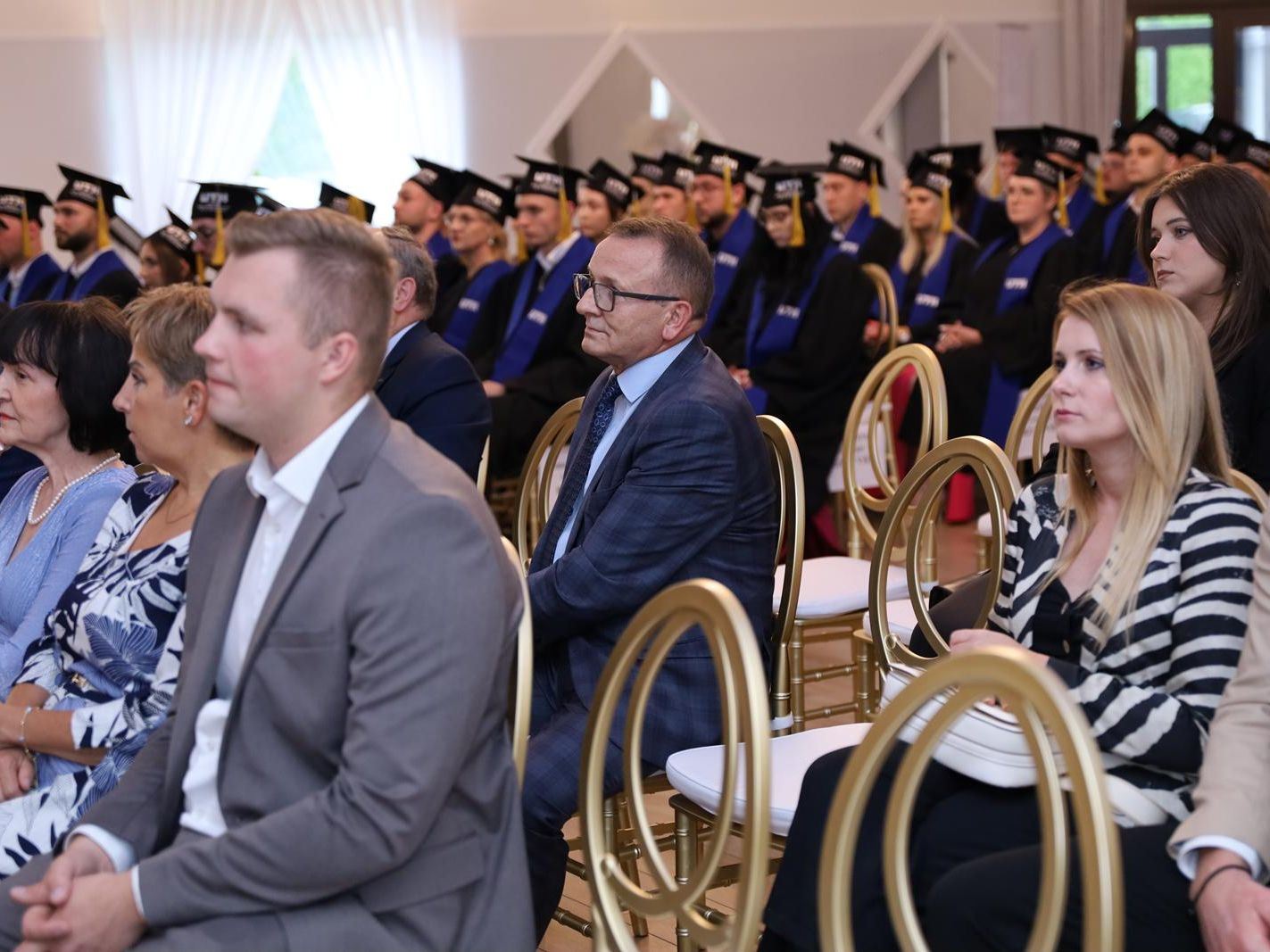 Galeria: Uroczystość zakończenia studiów w Wydziale Zamiejscowym w Płońsku 2026, obraz 55 z 57